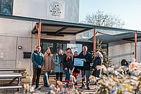 Scheckübergabe an eine KiTa